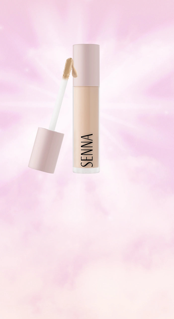 Luminous Lift Concealer tube and cap against pink illuminated background